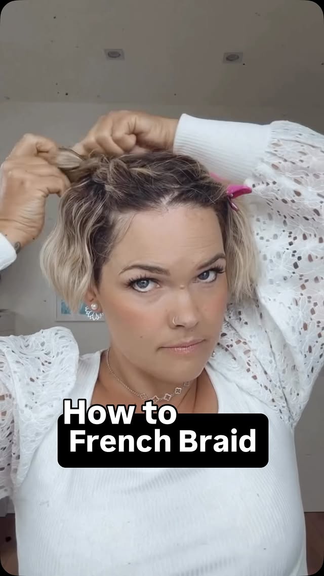 Two simple french braids on short hair 🤍I just braid 3 strands over the middle section and gently pull out a few pieces around the face to create a softer, messier look.Perfect for short hair, growing out an undercut or those in-between lengths by @salirasa