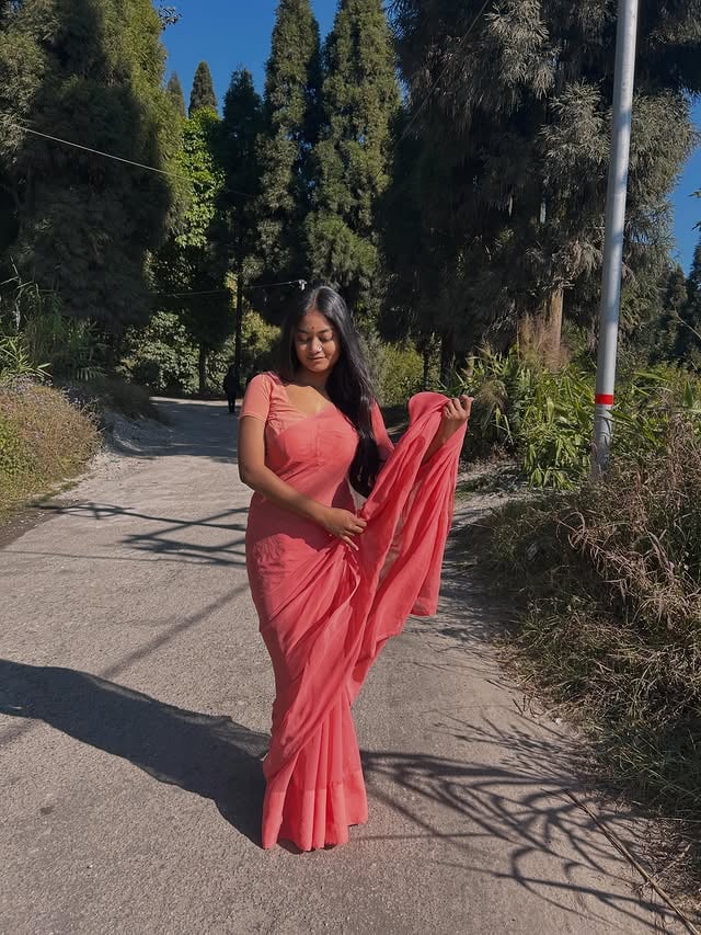 A saree, a mountain, and a moment I wanted to keep.…#summer #mountain #saree #fashion by @katha_nandi