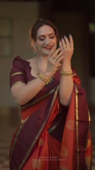 Classic Kanchipuram weaves, timeless elegance, and a shade of orange that radiates joy. 🍊💫

Saree @houseofizha 
Jewelleries @kallarackalladiescollection 
Video @sandeep_ktr 
@libin_valakom 
Mua @zoya_.makeover
Location @kallukunnuevents 
Blouse @prismdesigns_kottayam